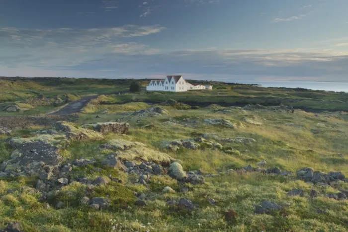 Framed Print : View of coastal tundra and buildings, Hafnarfjordur, Iceland, August Framed Print : View of coastal tundra and buildings, Hafnarfjordur, Iceland, August