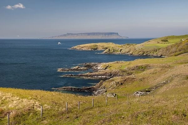 View of coastline and distant island, looking towards Eigg, Small Isles, across Sound of Sleat from Aird of Sleat