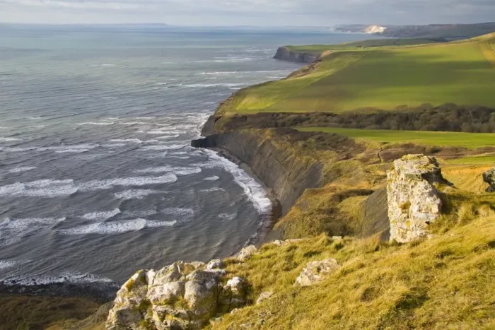 Framed Print : View of coastline with farmland and rough sea from high cliff, near Chapmans Pool, Dorset, England, january Framed Print : View of coastline with farmland and rough sea from high cliff, near Chapmans Pool, Dorset, England, january