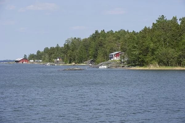 View of coastline with houses, Angskar, Baltic Sea, Uppland, Sweden, may
