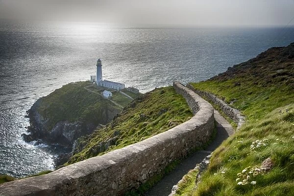 View of coastline and lighthouse, South Stack Lighthouse, Holyhead, Holy Island, Anglesey, Wales, August