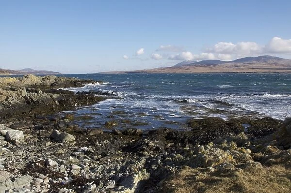 View of coastline, looking towards Jura, Islay Sound, Islay, Inner Hebrides, Scotland, March