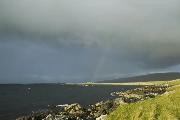 Framed Print : View of coastline and rainbow over abandoned croft, Fetlar, Shetland Islands, Scotland, June Framed Print : View of coastline and rainbow over abandoned croft, Fetlar, Shetland Islands, Scotland, June