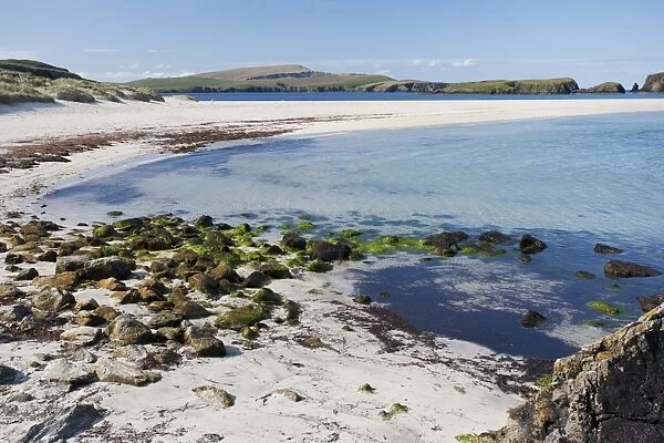 View of coastline and sandy beach, Bigton Wick, Mainland, Shetland Islands, Scotland, May