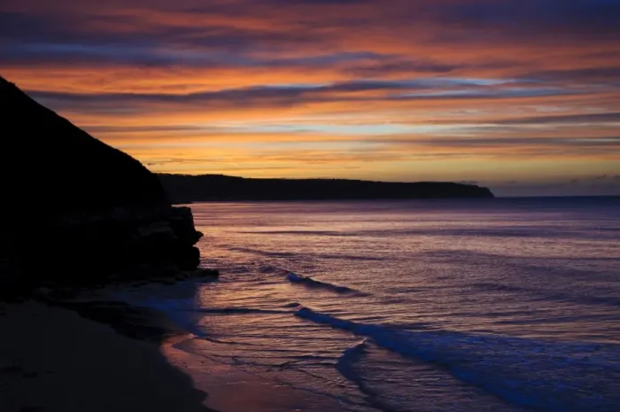 Framed Print : View of coastline silhouetted at sunset, looking from West Pier, Whitby, North Yorkshire, England, April Framed Print : View of coastline silhouetted at sunset, looking from West Pier, Whitby, North Yorkshire, England, April