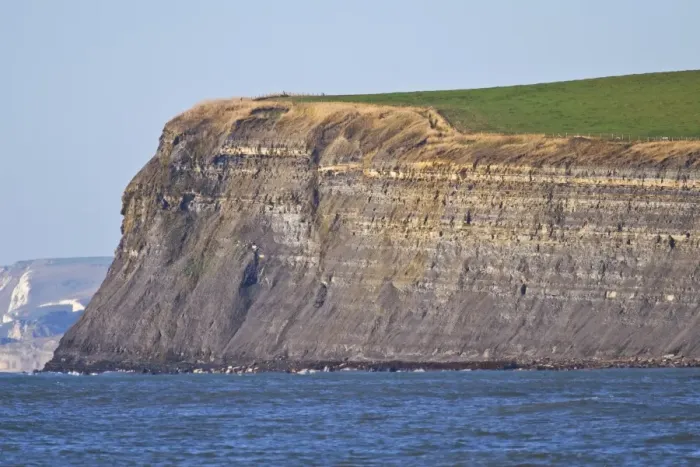 Framed Print : View of coastline with steep cliffs and rocky shoreline, near Chapmans Pool, Dorset, England, november