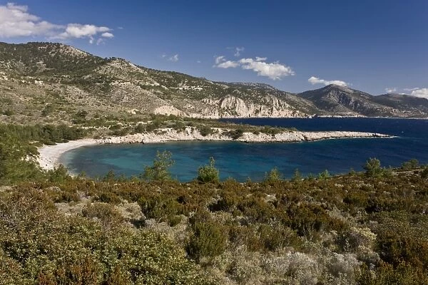 View of coastline on unspoilt west coast of island, Tighani Bay, Chios, Greece, April