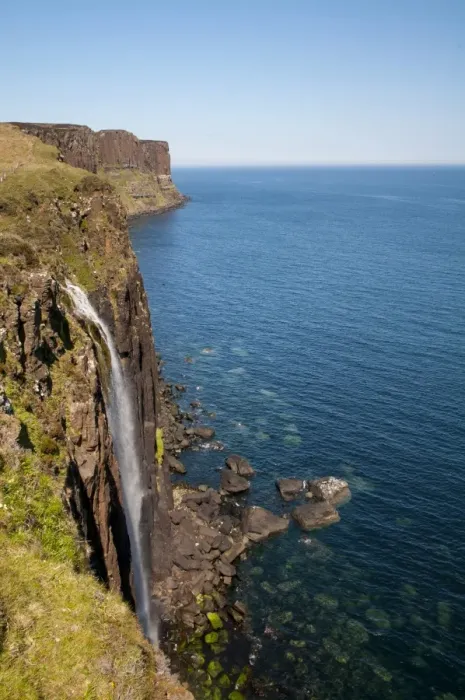 Framed Print : View of coastline with waterfall tumbling over cliffs into sea, with Kilt Rock in background, Mealt Falls Framed Print : View of coastline with waterfall tumbling over cliffs into sea, with Kilt Rock in background, Mealt Falls