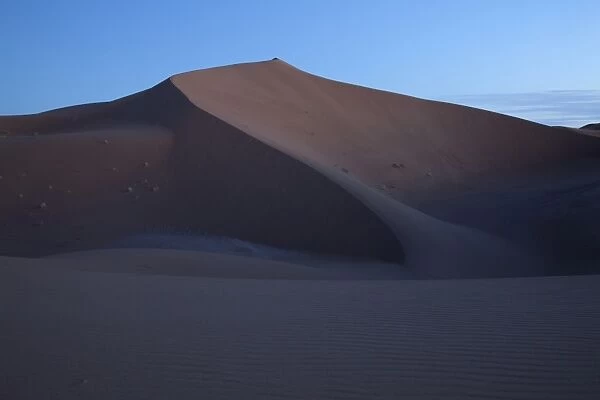 View of desert sand dunes at dusk, Erg Chegaga, Sahara, Morocco, may