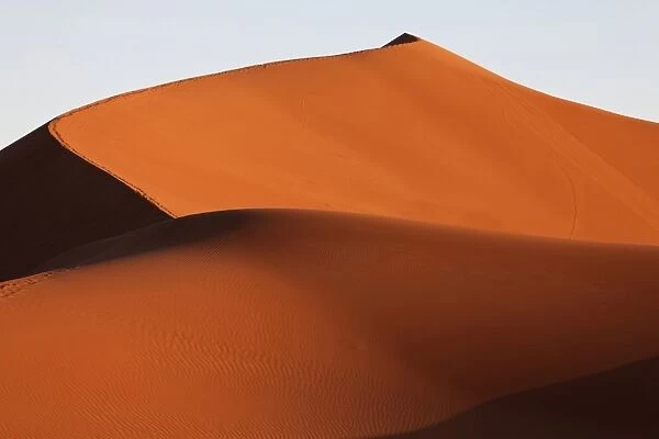 View of desert sand dunes in evening sunlight, Erg Chegaga, Sahara, Morocco, may
