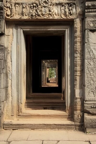 View through doorways with bas-relief in Khmer Hindu temple, Banteay Samre, Angkor, Siem Riep, Cambodia