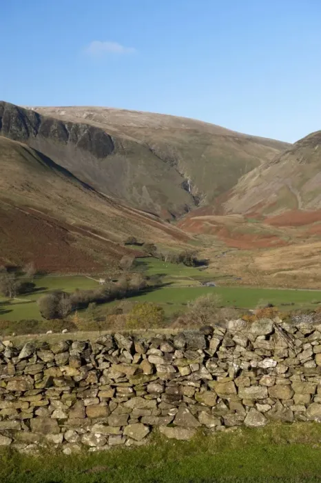 Framed Print : View of drystone wall and farmland in fell valley, with waterfall in distance Framed Print : View of drystone wall and farmland in fell valley, with waterfall in distance