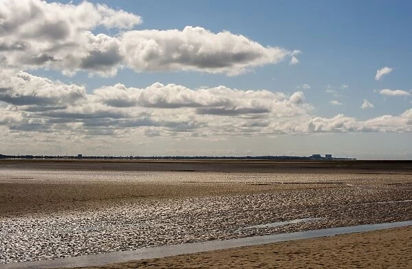 View across estuary at low tide, looking towards Morecambe, near Silverdale, Morecambe Bay, Lancashire, England, april
