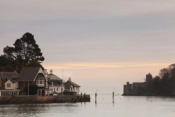 View of harbour entrance with Dartmouth Castle and Royal Dart Yacht Club at sunrise, Dartmouth Harbour, Dartmouth