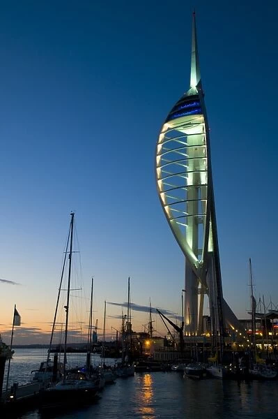 View of harbour and waterfront with Spinnaker Tower illuminated after sunset, Portsmouth Harbour, Portsmouth