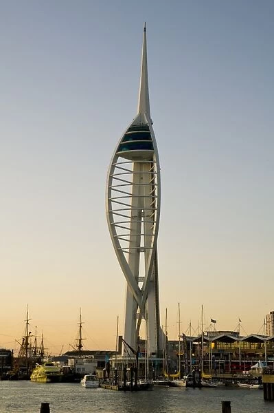 View of harbour and waterfront with Spinnaker Tower in evening light, Portsmouth Harbour, Portsmouth, Hampshire