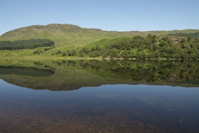 Framed Print : View of hills reflected in freshwater loch, Loch Lubhair, near Crianlarich, Trossachs, Stirling, Scotland, July