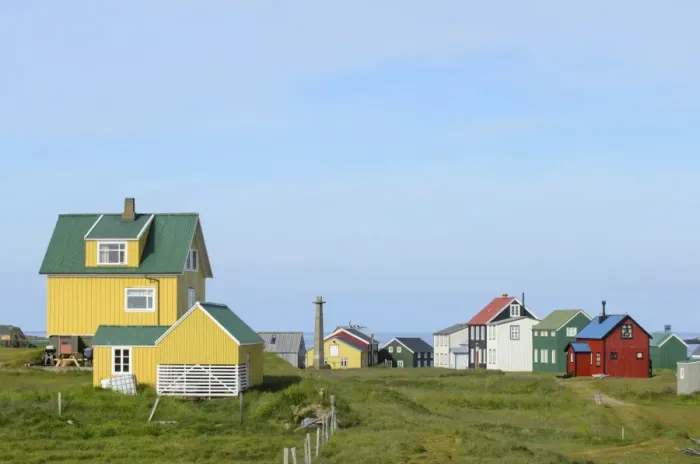 Framed Print : View of houses in coastal settlement, Flatey Island, Iceland, July Framed Print : View of houses in coastal settlement, Flatey Island, Iceland, July