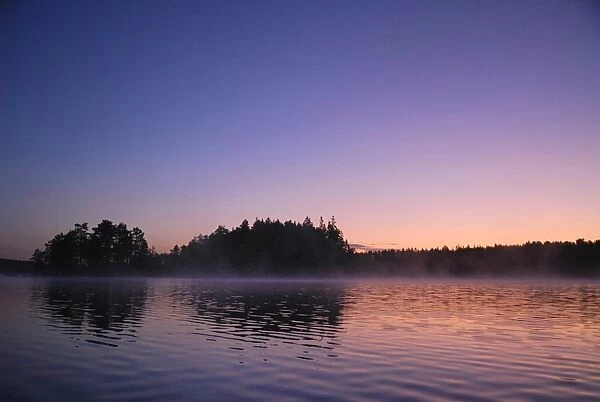 View of lake at sunrise, Langvattnet Lake, Malingsbo-Kloten Nature Reserve, Bergslagen, Central Sweden, august