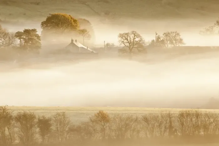 Framed Print : View of landscape shrouded in mist at sunrise, Trellech Grange, near Wye Valley, Monmouthshire, South Wales, December