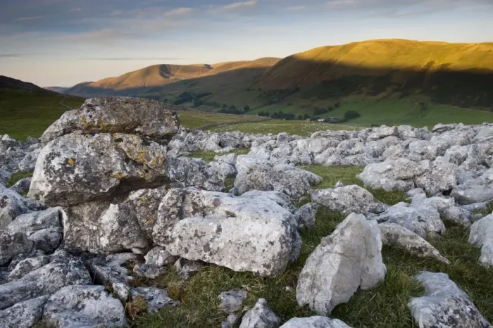 Framed Print : View of limestone pavement at sunrise, Fell End Clouds, looking towards Howgill Fells, Cumbria, England, November Framed Print : View of limestone pavement at sunrise, Fell End Clouds, looking towards Howgill Fells, Cumbria, England, November
