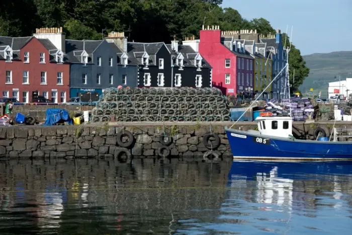 Framed Print : View of lobster pots and fishing boat at harbour of coastal town, Tobermory, Isle of Mull, Inner Hebrides, Scotland Framed Print : View of lobster pots and fishing boat at harbour of coastal town, Tobermory, Isle of Mull, Inner Hebrides, Scotland