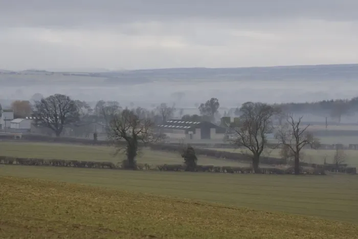 Framed Print : View of mist over fields and farm buildings, with low cloud over moorland in distance, North Yorkshire Moors Framed Print : View of mist over fields and farm buildings, with low cloud over moorland in distance, North Yorkshire Moors