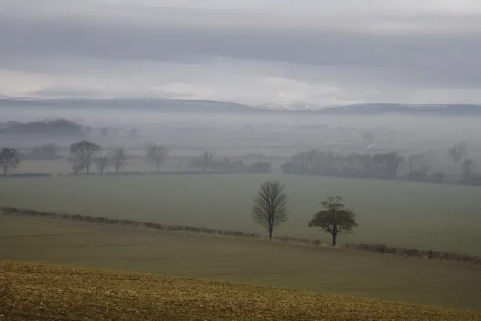 Framed Print : View of mist over fields, with low cloud over moorland in distance, North Yorkshire Moors, near Slingsby Framed Print : View of mist over fields, with low cloud over moorland in distance, North Yorkshire Moors, near Slingsby