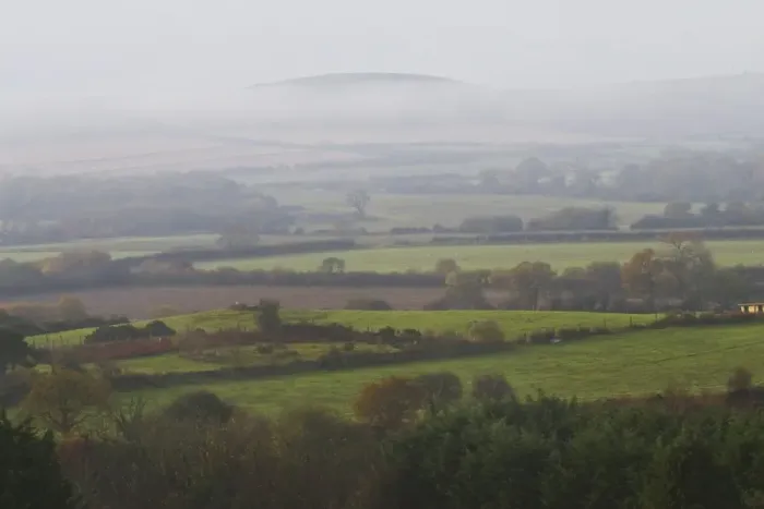 Framed Print : View of misty countryside, with mixed pasture and arable fields, Purbeck Hills in distance, Dorset, England, november Framed Print : View of misty countryside, with mixed pasture and arable fields, Purbeck Hills in distance, Dorset, England, november