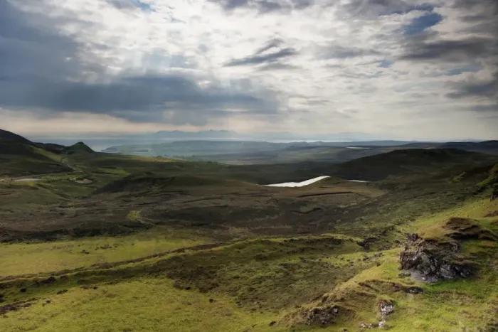 Framed Print : View across moorland towards coastline, with Applecross Peninsula in distance, looking from The Quiraing Framed Print : View across moorland towards coastline, with Applecross Peninsula in distance, looking from The Quiraing