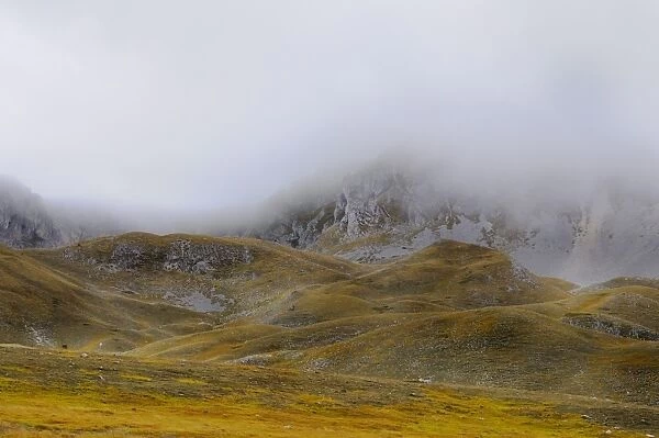 View of mountain plateau in low cloud, Gran Sasso N. P. Apennines, Abruzzo, Italy, september