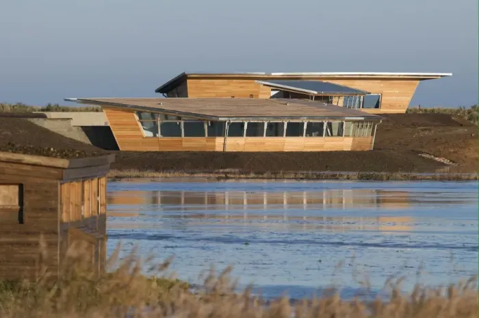 Framed Print : View of new hides and information centre in coastal wetland reserve, Titchwell RSPB Reserve, Norfolk, England, december Framed Print : View of new hides and information centre in coastal wetland reserve, Titchwell RSPB Reserve, Norfolk, England, december