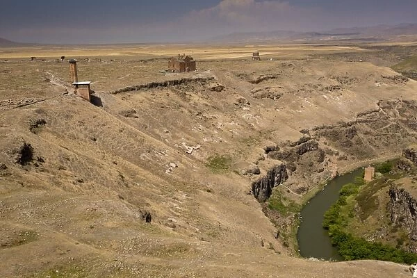 View of remote ruined medieval Armenian Turkish city, along River Akhourian forming border between Turkey and Armenia