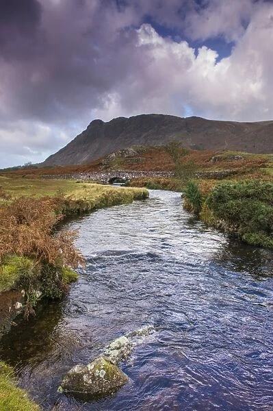 View of river and bridge in upland valley, with Seatallan Peak in background, Overbeck Bridge, Over Beck