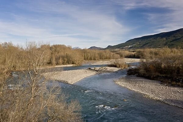 View of river habitat with gravel island, Rio Aragon, Puente La Reina de Jaca, Huesca, Aragon, Spain, March