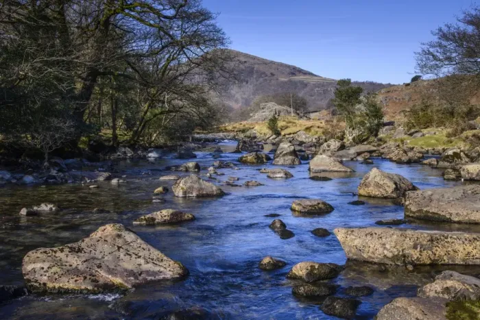 Framed Print : View of river with The Pike in background, River Duddon, Ulpha, Duddon Valley, Lake District N. P Framed Print : View of river with The Pike in background, River Duddon, Ulpha, Duddon Valley, Lake District N. P