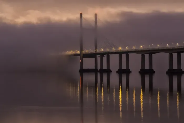 Framed Print : View of road bridge over river shrouded in mist at sunrise, viewed from Divers Rock at Sudbrook Framed Print : View of road bridge over river shrouded in mist at sunrise, viewed from Divers Rock at Sudbrook