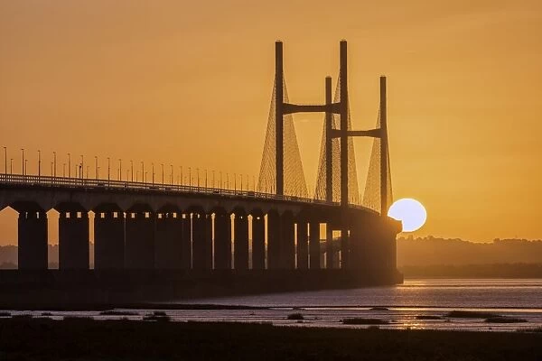 View of road bridge over river at sunrise, viewed from Caldicot, Second Severn Crossing, River Severn, Severn Estuary