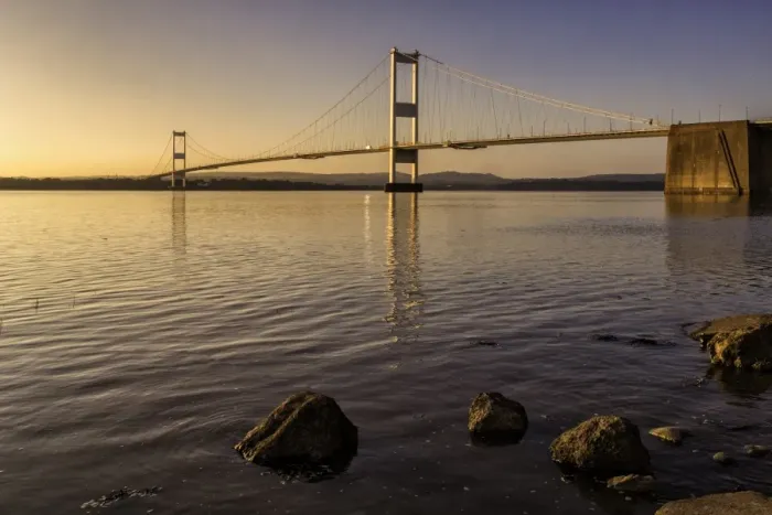 Framed Print : View of road bridge over river at sunset, viewed from Aust, Severn Bridge (First Severn Crossing), River Severn Framed Print : View of road bridge over river at sunset, viewed from Aust, Severn Bridge (First Severn Crossing), River Severn