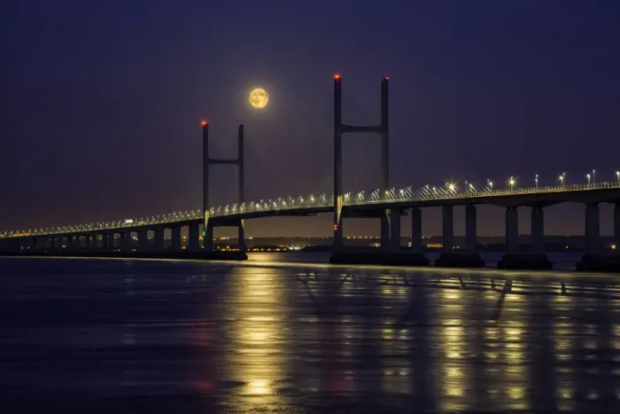 Framed Print : View of road bridge over river at twilight with full moon, viewed from Divers Rock at Sudbrook, Second Severn Crossing Framed Print : View of road bridge over river at twilight with full moon, viewed from Divers Rock at Sudbrook, Second Severn Crossing