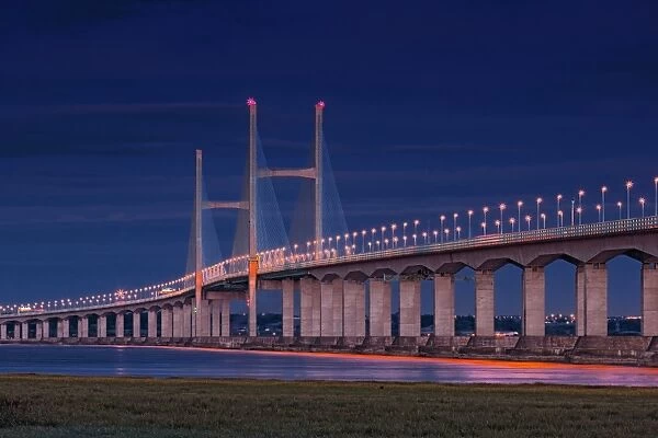 View of road bridge over river at twilight, viewed from Caldicot, Second Severn Crossing, River Severn, Severn Estuary