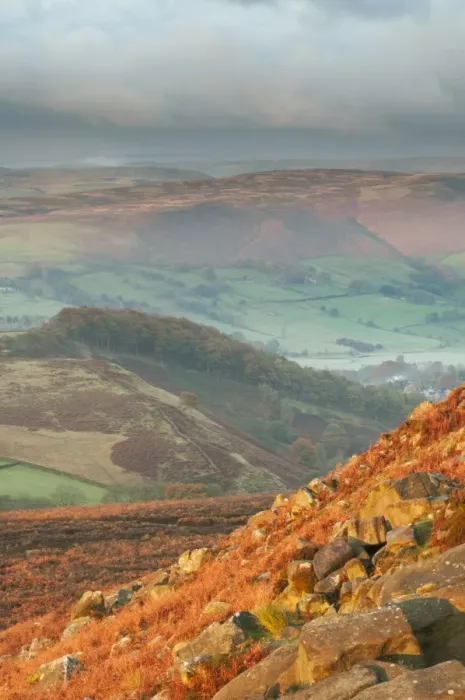 Framed Print : View of rocks and moorland habitat across valley at sunrise, looking from Higger Tor towards Burbage Moor