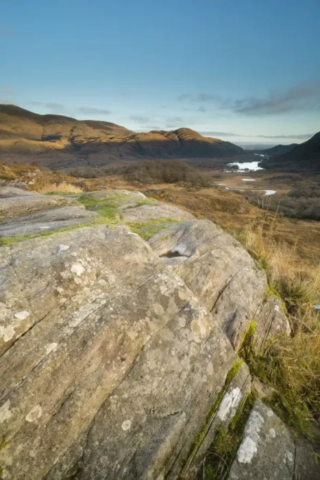 Framed Print : View over rocks on moorland towards lake and mountains at dawn, Ladies View, Lough Leane (Lower Lake) Framed Print : View over rocks on moorland towards lake and mountains at dawn, Ladies View, Lough Leane (Lower Lake)