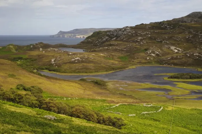 Framed Print : View of rocky hillside overlooking freshwater loch and north coast, Loch Ach an Lochaidh, Sutherland, Highlands Framed Print : View of rocky hillside overlooking freshwater loch and north coast, Loch Ach an Lochaidh, Sutherland, Highlands