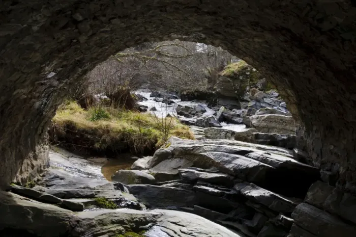 Framed Print : View of rocky river through bridge arch, River Feshie, Feshiebridge, Cairngorms N. P Framed Print : View of rocky river through bridge arch, River Feshie, Feshiebridge, Cairngorms N. P