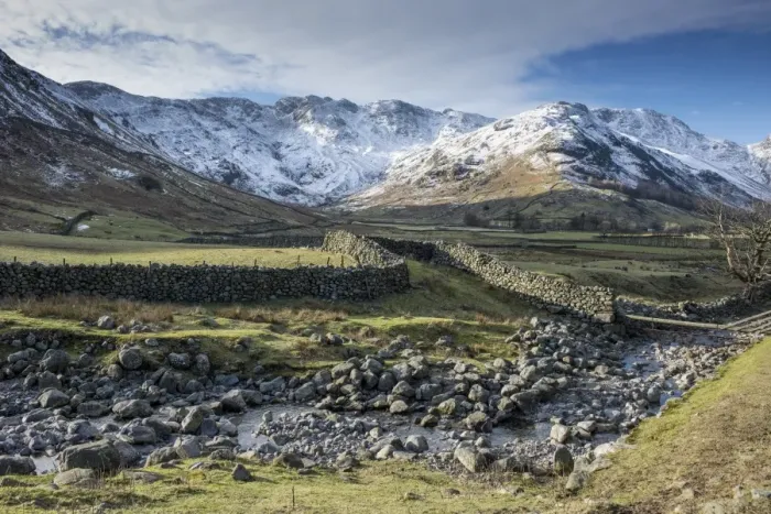 Framed Print : View across rocky stream, drystone walls and valley pasture towards snow covered fell, Langdale Fell, Great Langdale Framed Print : View across rocky stream, drystone walls and valley pasture towards snow covered fell, Langdale Fell, Great Langdale