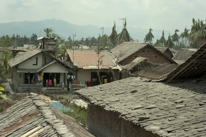 Framed Print : View over roofs covered in ash, from recent volcanic eruption, near Jogyakarta, Mount Merapi, Central Java, Indonesia Framed Print : View over roofs covered in ash, from recent volcanic eruption, near Jogyakarta, Mount Merapi, Central Java, Indonesia