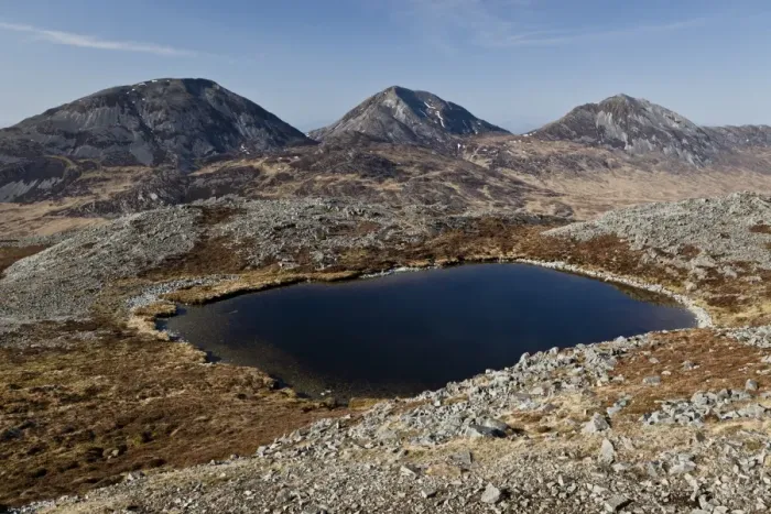 Framed Print : View of small freshwater lochan at top of marilyn hill, with Paps of Jura mountain peaks in background, Glas Bheinn Framed Print : View of small freshwater lochan at top of marilyn hill, with Paps of Jura mountain peaks in background, Glas Bheinn