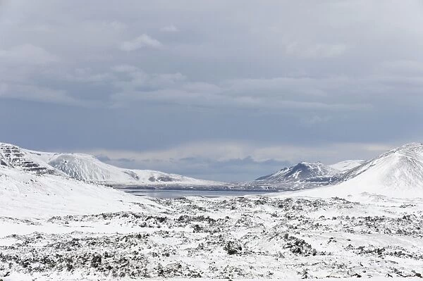 View of snow covered coastline, Snaefellsnes, Vesturland, Iceland, March