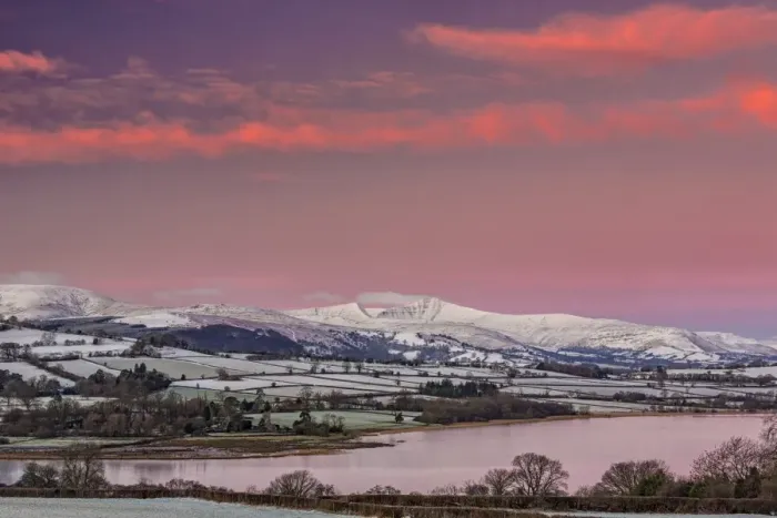 Framed Print : View of snow covered farmland and hills at sunrise, looking from Mynydd Llangorse, Llangorse Lake, Brecon Beacons N. P Framed Print : View of snow covered farmland and hills at sunrise, looking from Mynydd Llangorse, Llangorse Lake, Brecon Beacons N. P